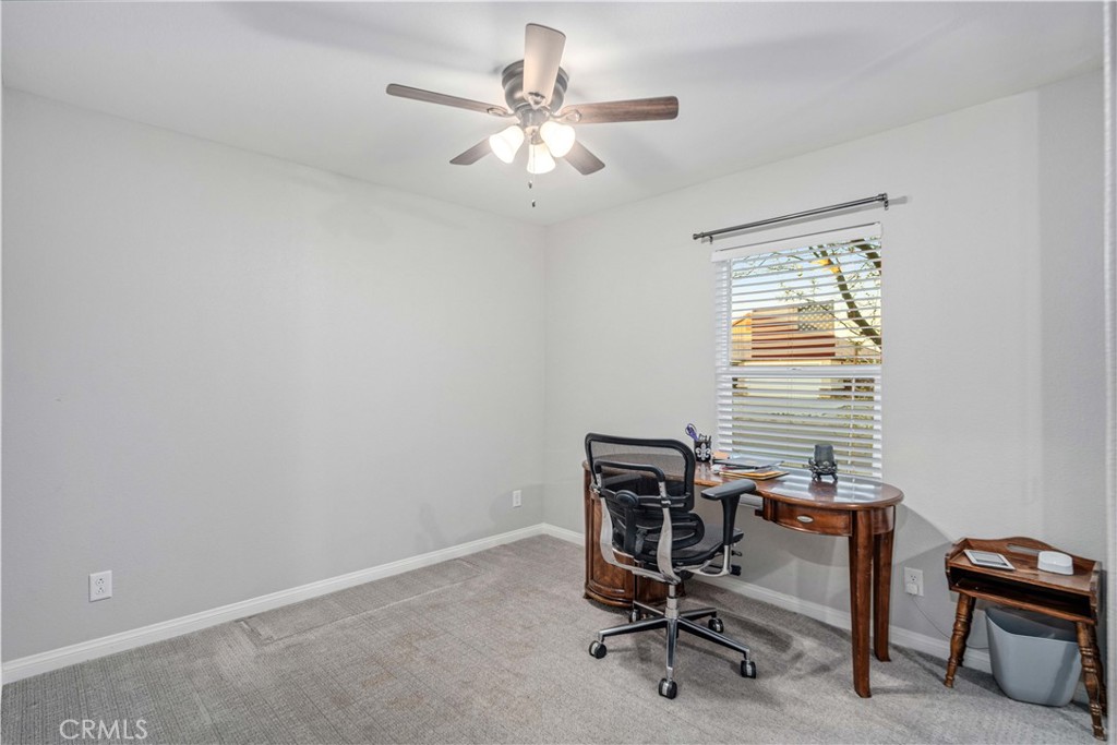 44451 63rd Street West Lancaster, CA 93536 - Photo 24 of 47 a view of a workspace with furniture