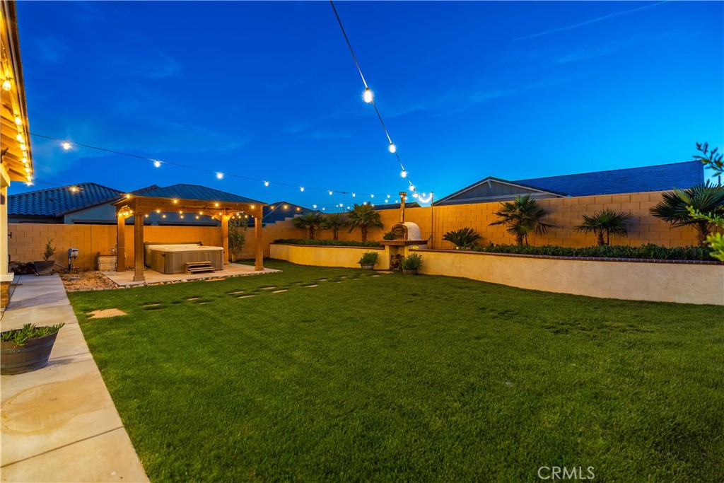 44451 63rd Street West Lancaster, CA 93536 - Photo 29 of 47 a view of a garden with an outdoor space