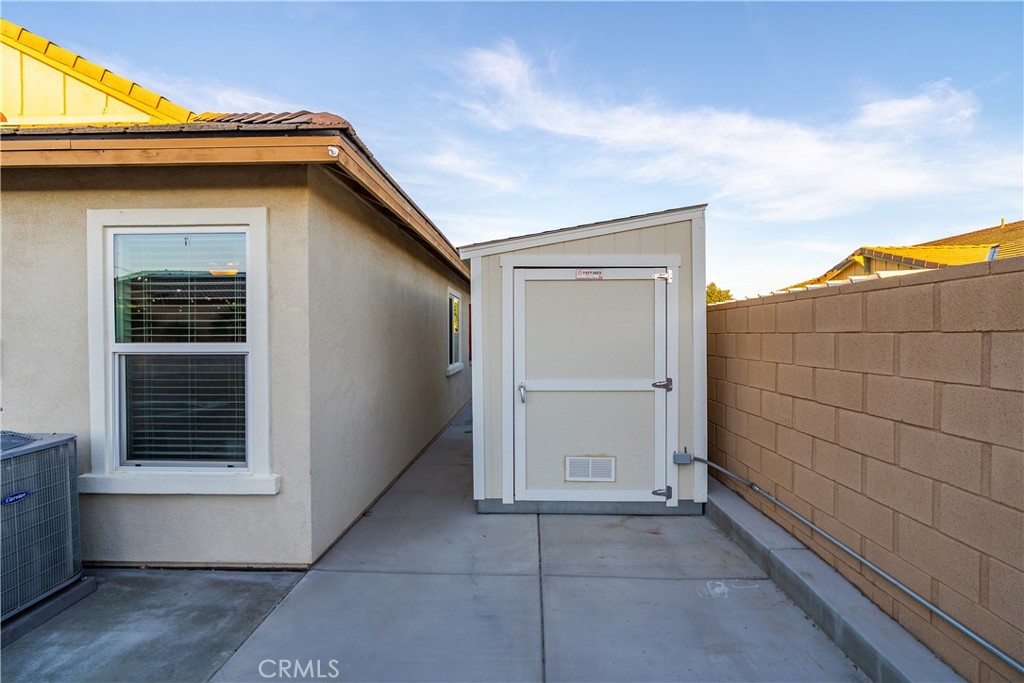 44451 63rd Street West Lancaster, CA 93536 - Photo 40 of 47 a view of a house with backyard