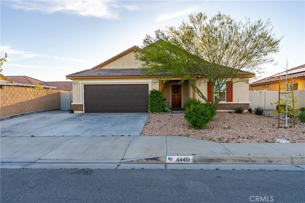 44451 63rd Street West Lancaster, CA 93536 - Photo 44 of 47 front view of a house with a yard