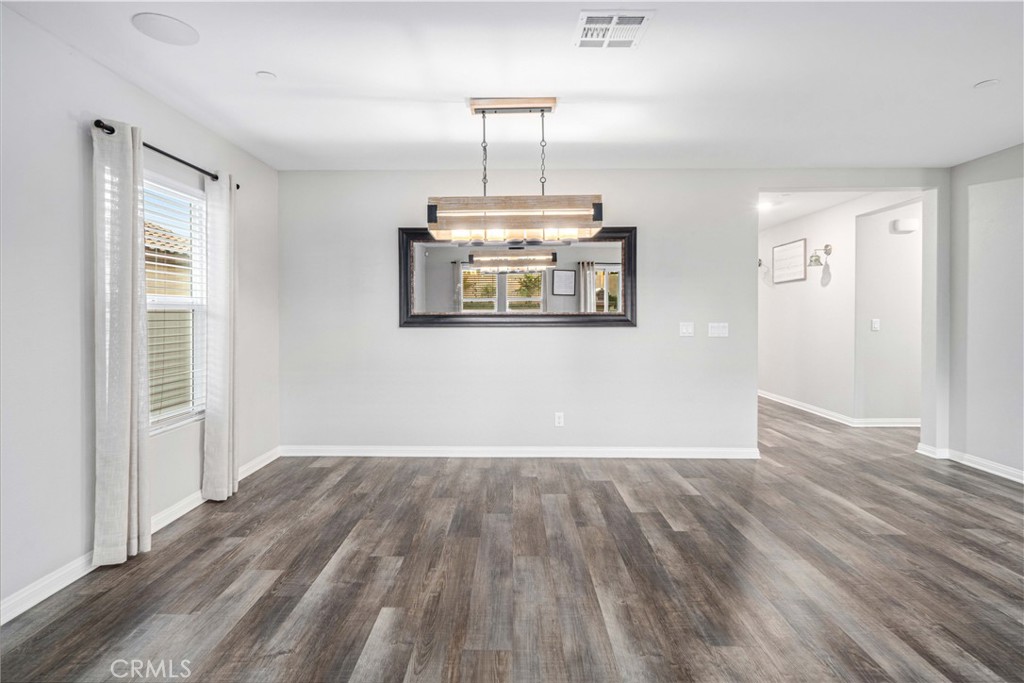 44451 63rd Street West Lancaster, CA 93536 - Photo 9 of 47 a view of livingroom with hardwood floor and window