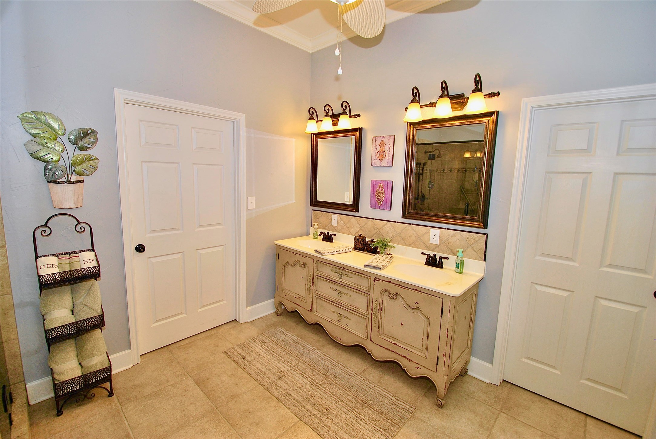 27368 Highway 19 Athens, TX 75752 - Photo 24 of 47 a spacious bathroom with a double vanity sink and a mirror