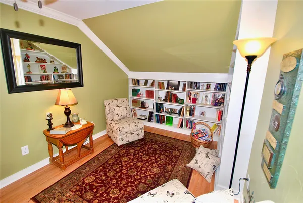 a room with pool table and painted walls