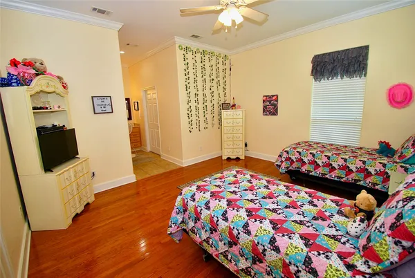 a view of a bedroom with furniture and rug