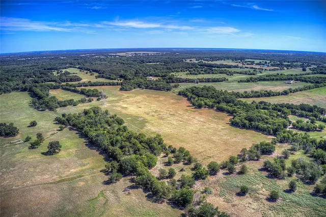 a view of a lake with a city