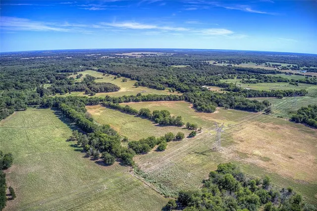a view of a city with mountains in the background