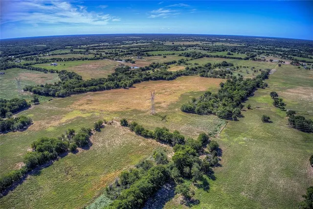 an aerial view of lake residential house with outdoor space