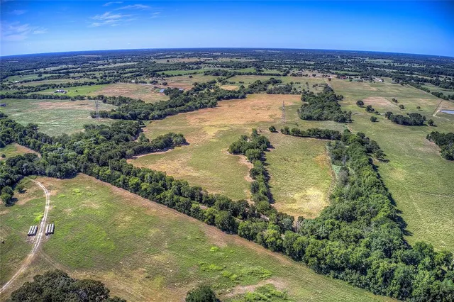 an aerial view of mountain with beach