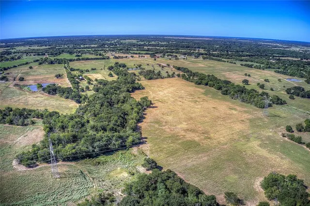 an aerial view of beach and ocean