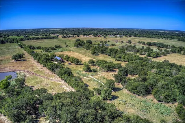 a view of a city with an ocean