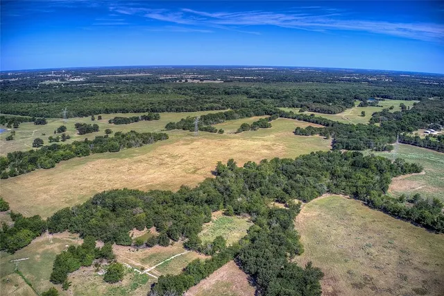 a view of an ocean and mountain