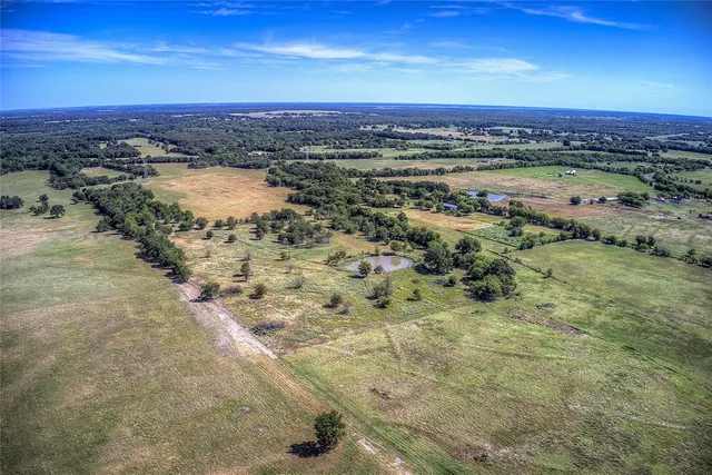 a view of a ocean with a beach