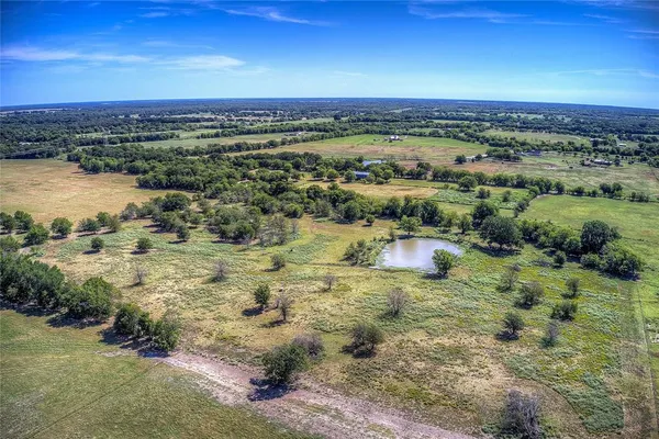 a view of a lake with a city