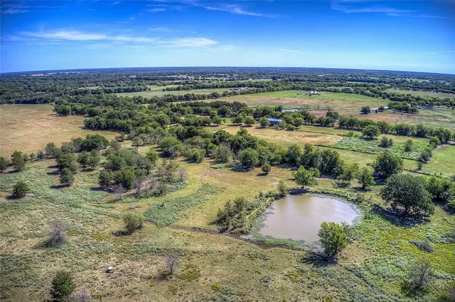 a view of a lake with a city