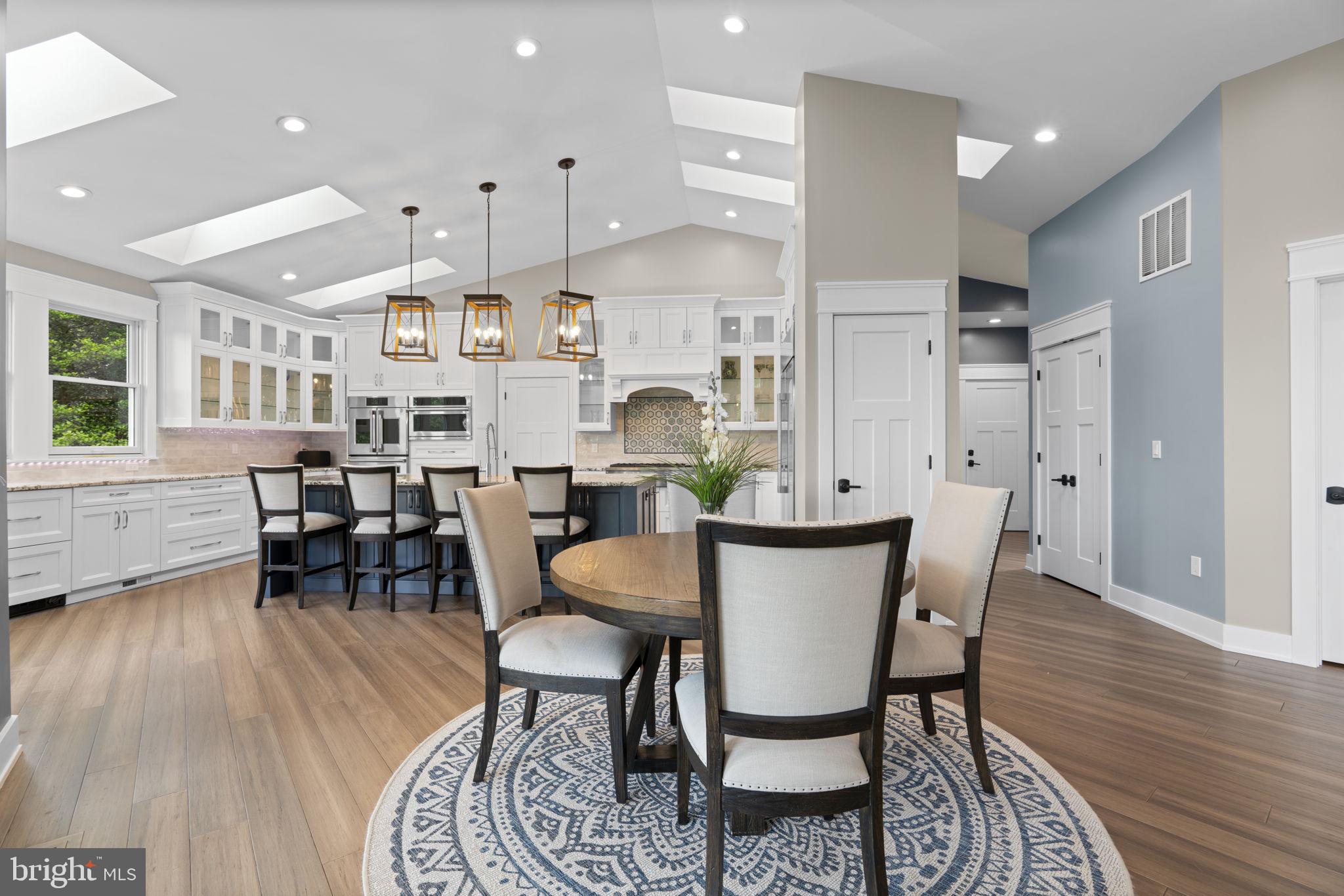 798 Creek View Road Severna Park, MD 21146 - Photo 12 of 72 a view of a a dining room with furniture window and wooden floor