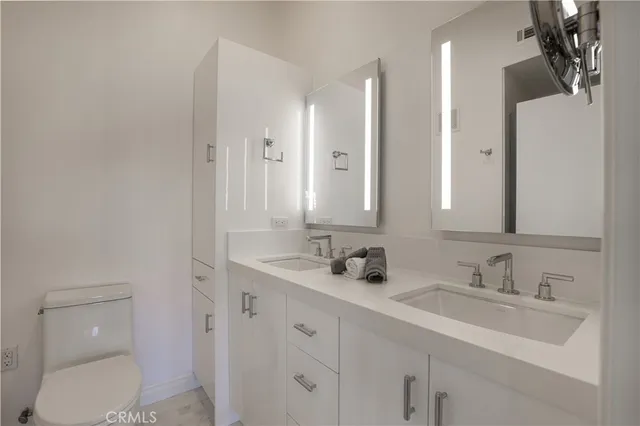 a bathroom with a sink and a toilet