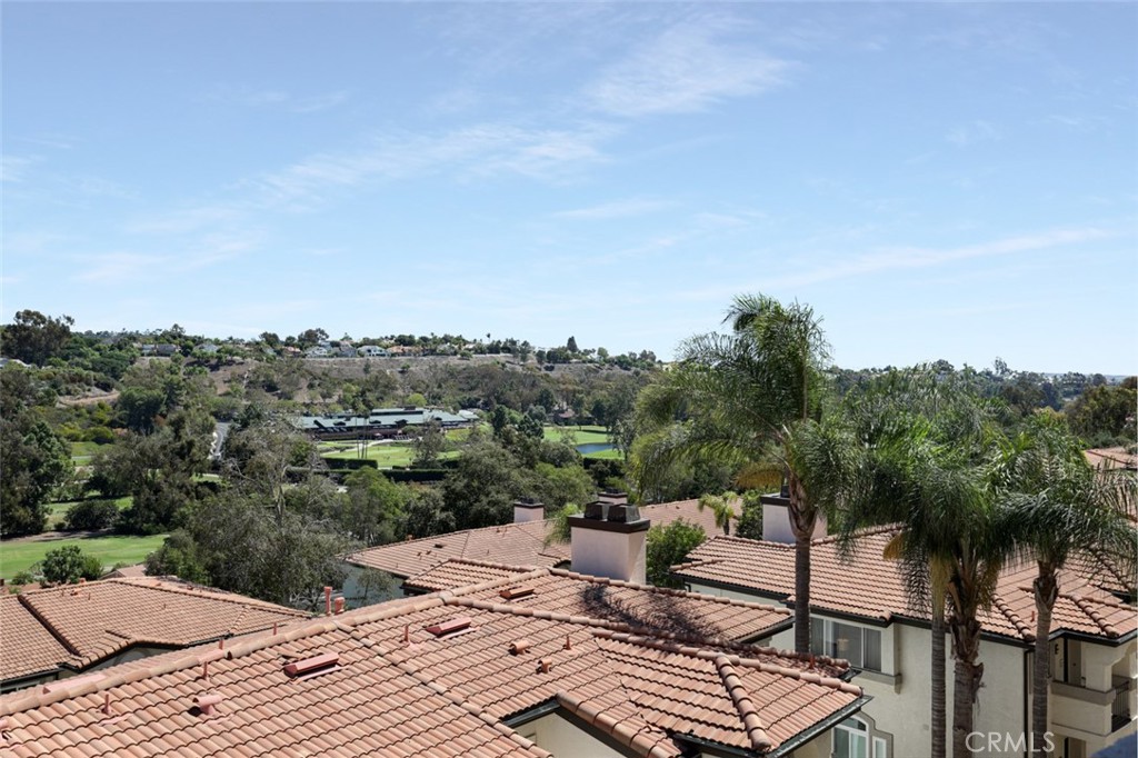 30902 Club House Drive, Unit 11J Laguna Niguel, CA 92677 - Photo 2 of 32 a view of a terrace with a bench