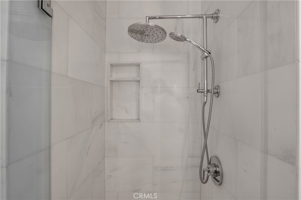 30902 Club House Drive, Unit 11J Laguna Niguel, CA 92677 - Photo 21 of 32 a bathroom with a shower