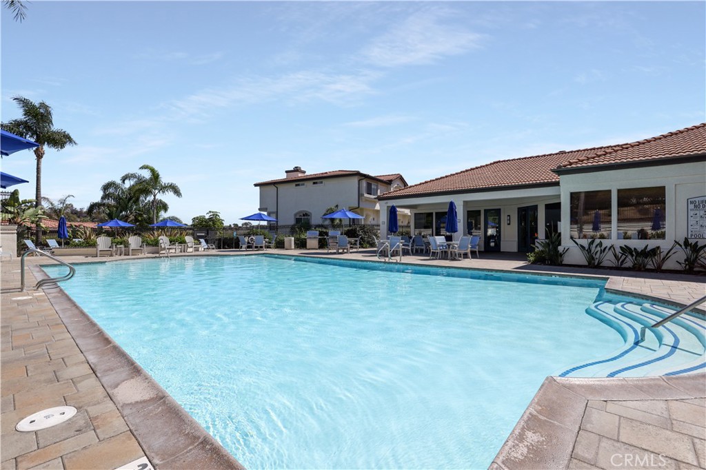 30902 Club House Drive, Unit 11J Laguna Niguel, CA 92677 - Photo 31 of 32 a view of house with swimming pool outdoor seating