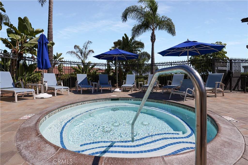30902 Club House Drive, Unit 11J Laguna Niguel, CA 92677 - Photo 32 of 32 a view of a swimming pool with a patio