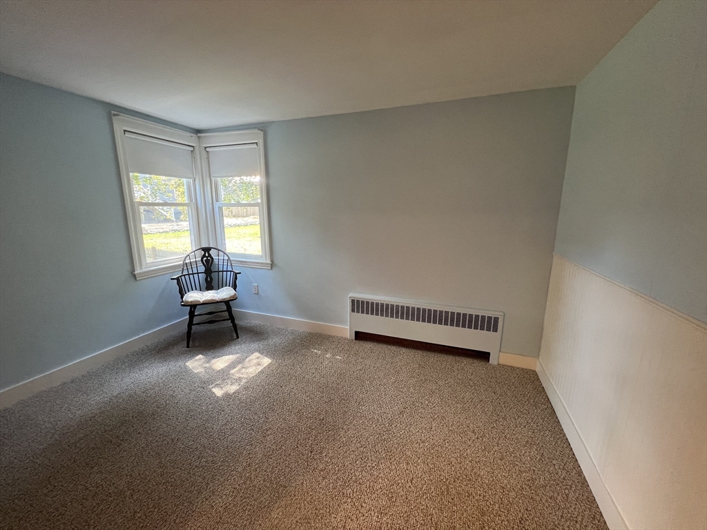 48 Ashton Street Beverly, MA 01915 - Photo 17 of 24 a view of an empty room with a window