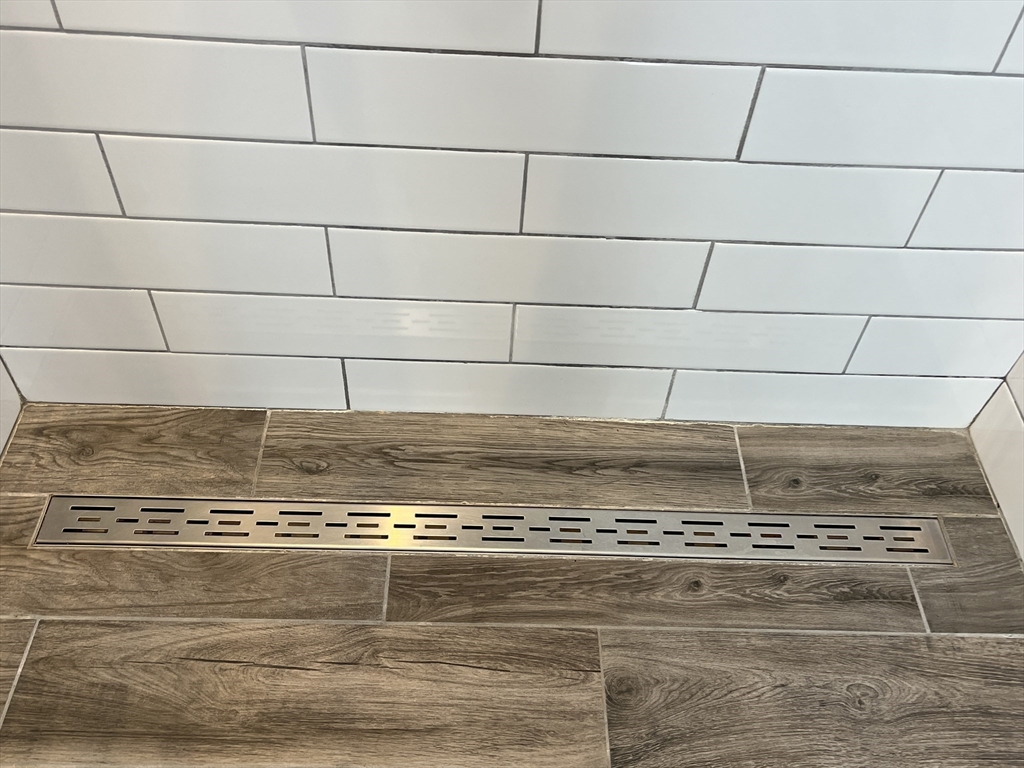 48 Ashton Street Beverly, MA 01915 - Photo 20 of 24 a view of a water heater