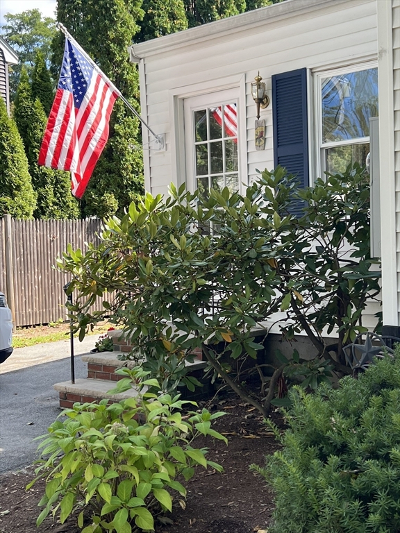 48 Ashton Street Beverly, MA 01915 - Photo 5 of 24 a view of a house with a backyard