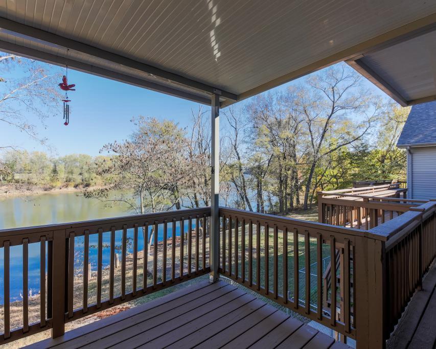 323 Mayhew Road Clarksville, TN 37040 - Photo 2 of 30 a view of a porch with wooden floor and outdoor space