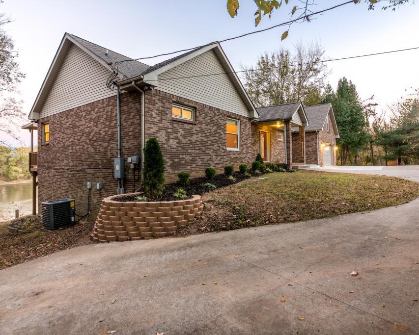 323 Mayhew Road Clarksville, TN 37040 - Photo 30 of 30 a front view of a house with a yard