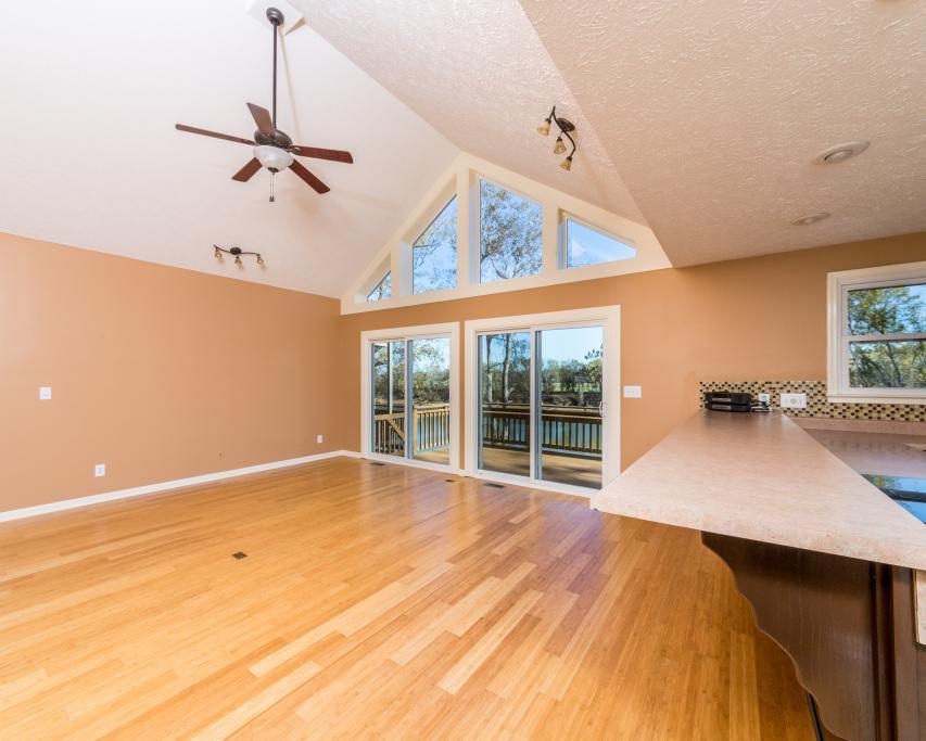 323 Mayhew Road Clarksville, TN 37040 - Photo 4 of 30 a view of empty room with wooden floor and fan