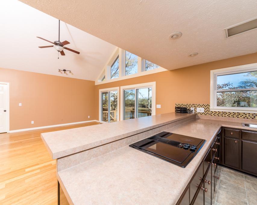 323 Mayhew Road Clarksville, TN 37040 - Photo 6 of 30 a kitchen with a stove a sink and a refrigerator