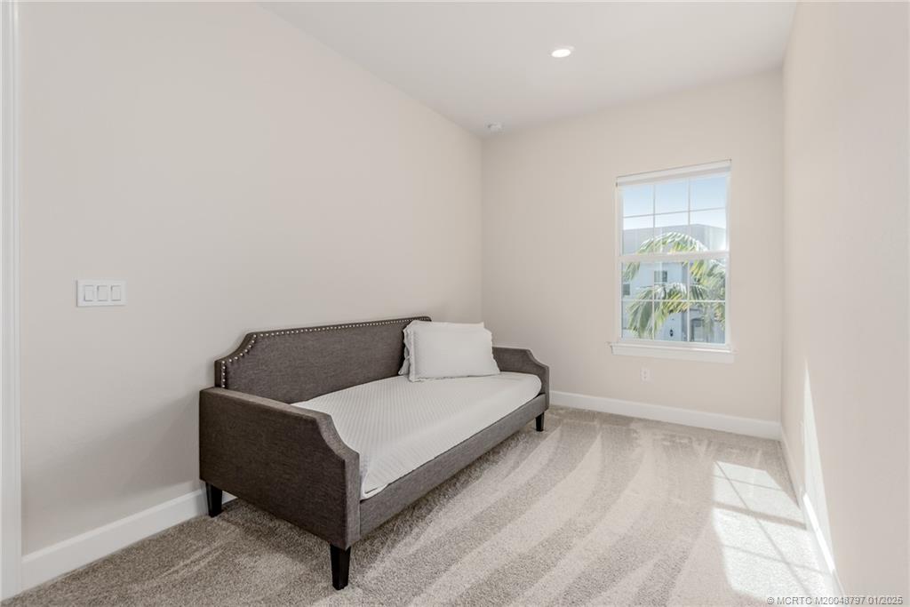 1865 Southeast Tarni Way Stuart, FL 34996 - Photo 15 of 23 a living room with furniture and a window