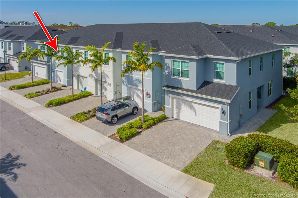 1865 Southeast Tarni Way Stuart, FL 34996 - Photo 23 of 23 a view of an house with porch and furniture