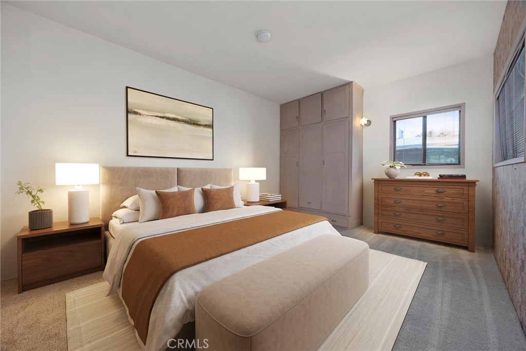 240 South Real Road Bakersfield, CA 93309 - Photo 15 of 35 a bedroom with a bed and wooden floor