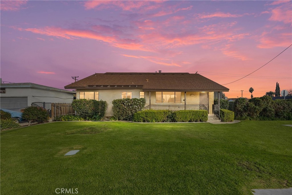 240 South Real Road Bakersfield, CA 93309 - Photo 2 of 35 a front view of a house with a yard