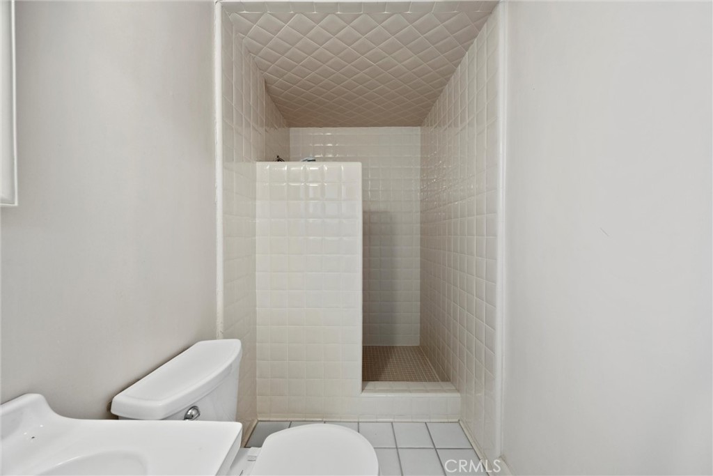 240 South Real Road Bakersfield, CA 93309 - Photo 25 of 35 a bathroom with a toilet and a shower