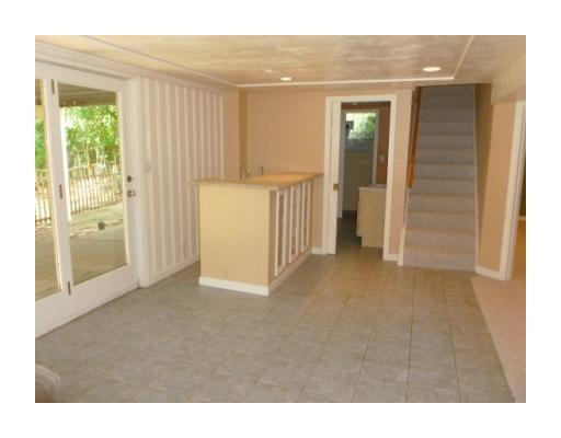 207 Rockingham Road Pittsburgh, PA 15238 - Photo 15 of 18 Family Room. Lower level family room with wet bar, ceramic tile floor, full bath, access to rear patio and yard