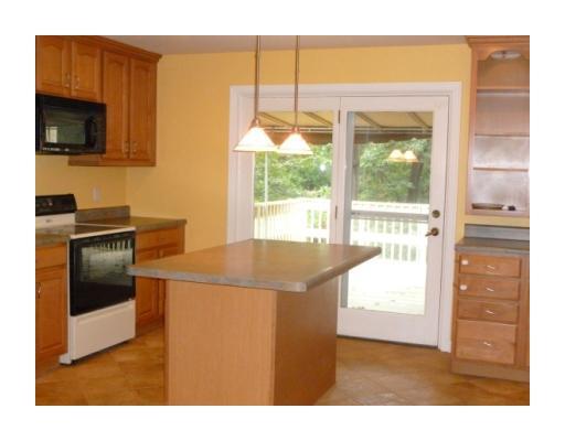 207 Rockingham Road Pittsburgh, PA 15238 - Photo 5 of 18 Kitchen. Updated kitchen with center island and access to rear, upper level deck