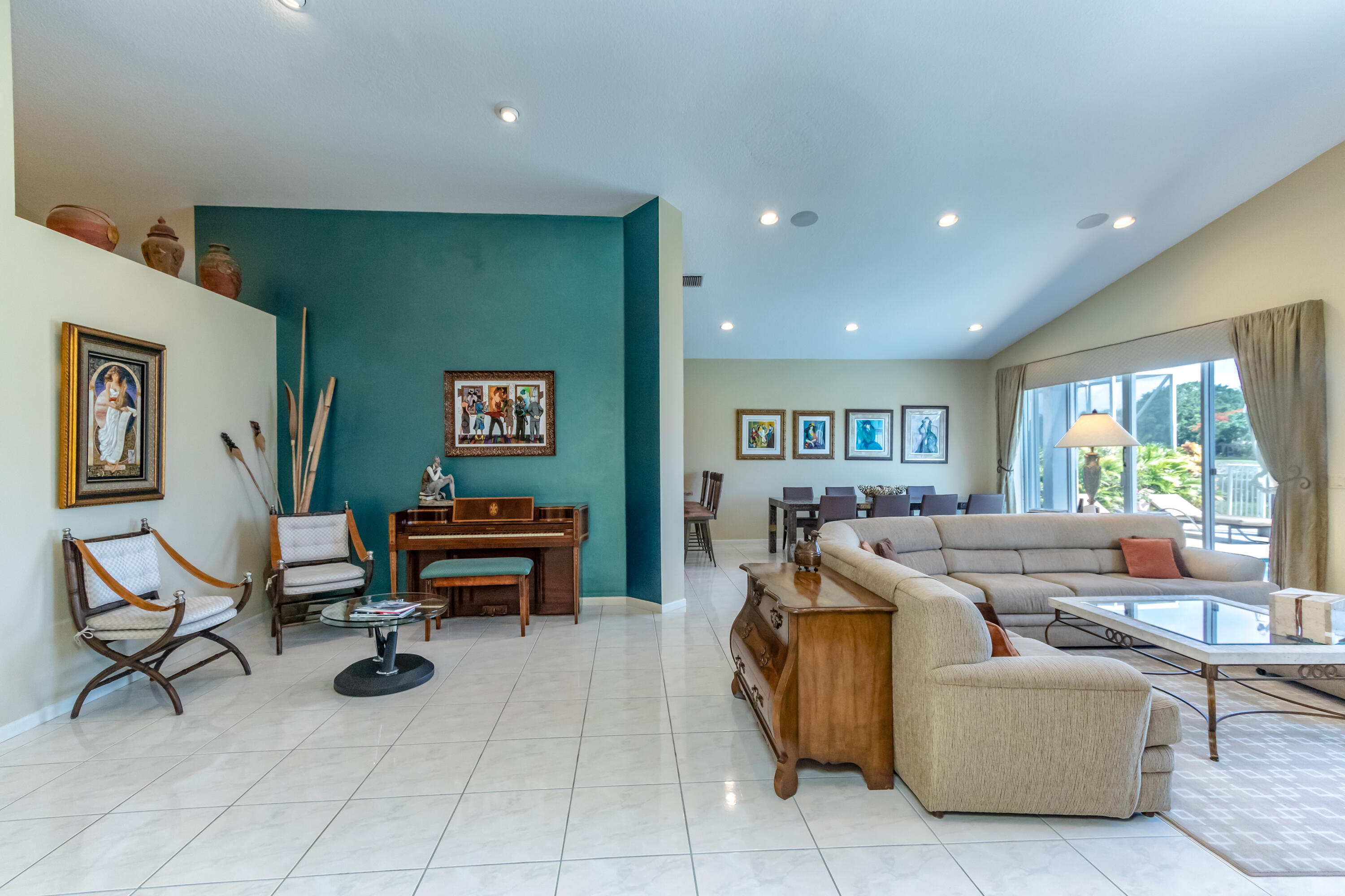 23402 Torre Circle Boca Raton, FL 33433 - Photo 11 of 44 a living room with furniture and a large window
