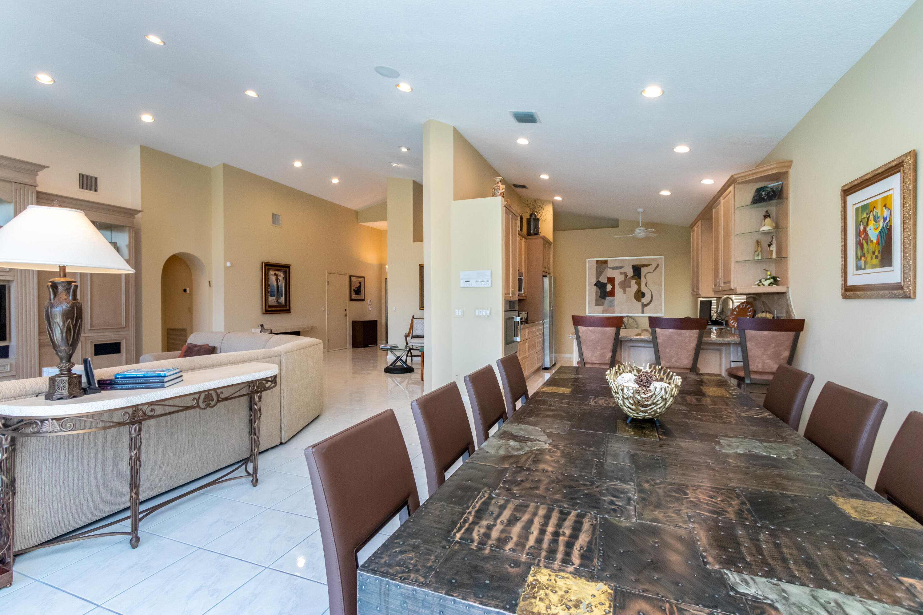 23402 Torre Circle Boca Raton, FL 33433 - Photo 15 of 44 a large kitchen with a table and chairs