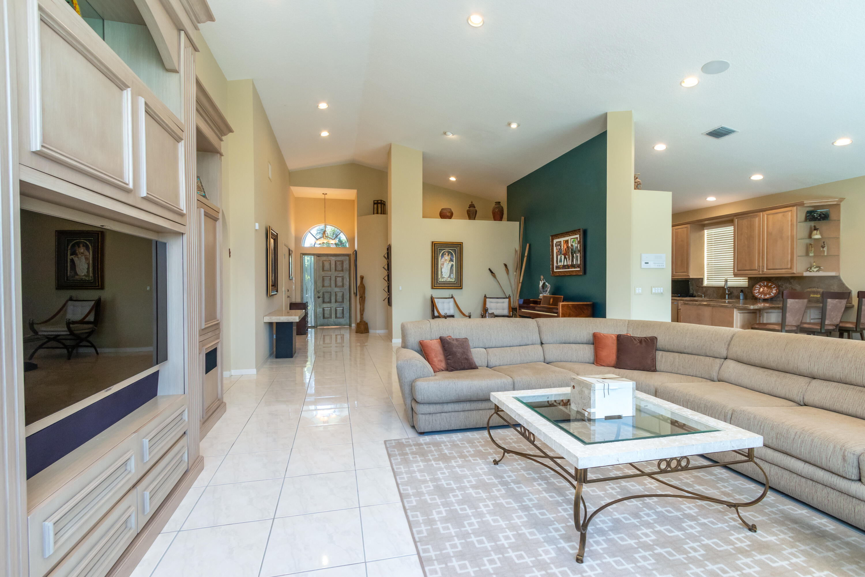 23402 Torre Circle Boca Raton, FL 33433 - Photo 16 of 44 a living room with furniture and a view of kitchen