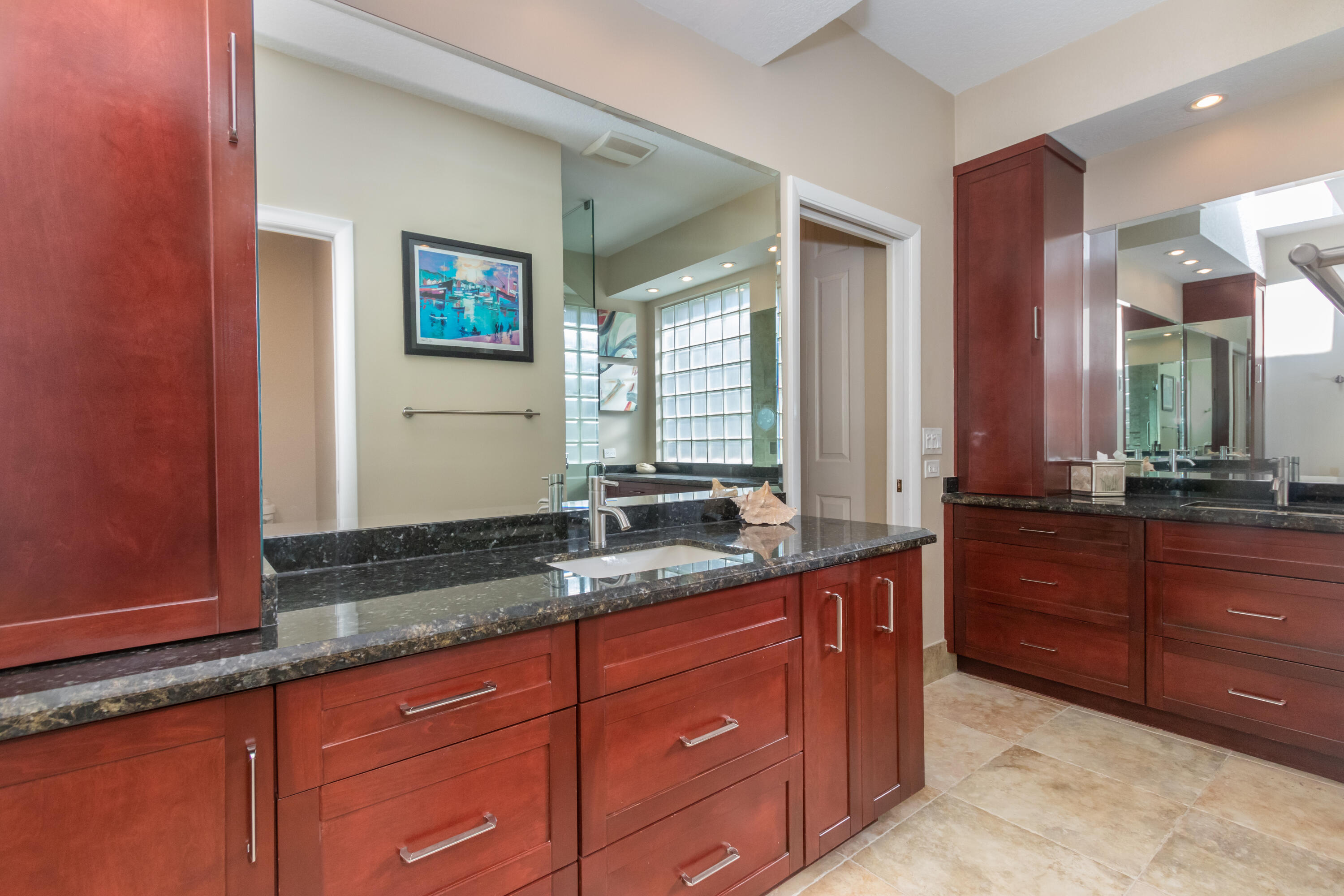 23402 Torre Circle Boca Raton, FL 33433 - Photo 21 of 44 a bathroom with a granite countertop sink and a mirror