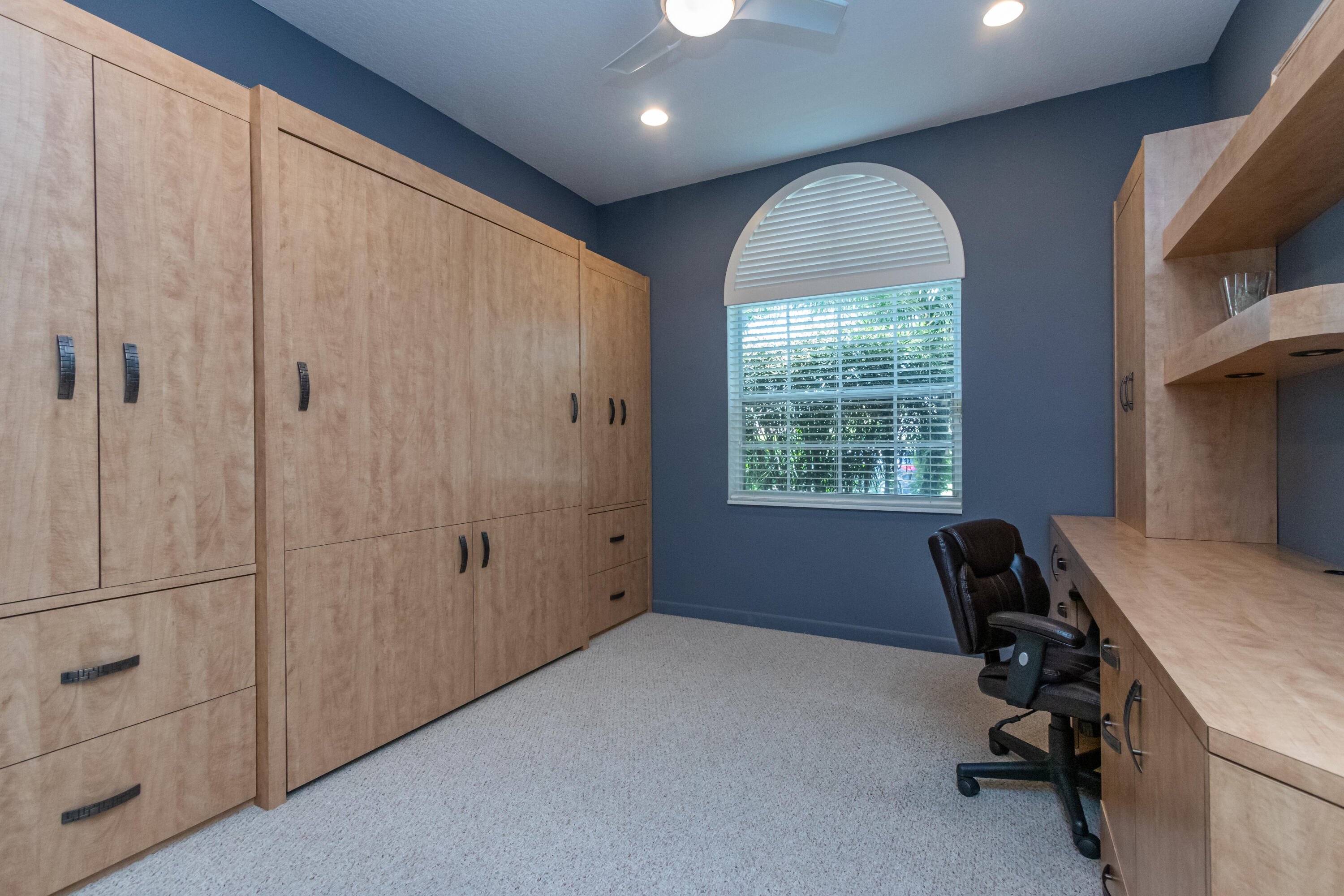 23402 Torre Circle Boca Raton, FL 33433 - Photo 25 of 44 a workspace with furniture and a window