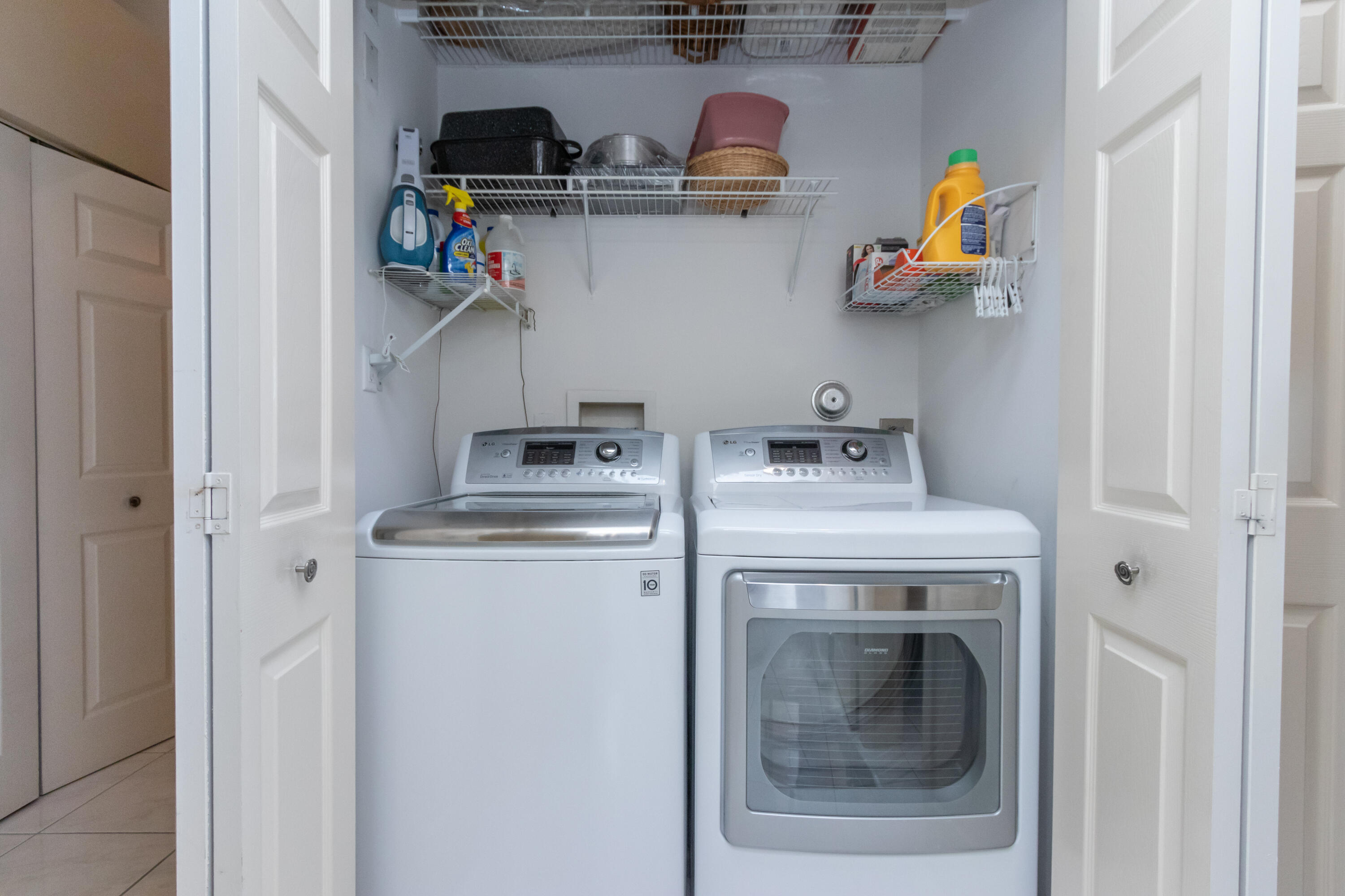 23402 Torre Circle Boca Raton, FL 33433 - Photo 32 of 44 a utility room with dryer and washer