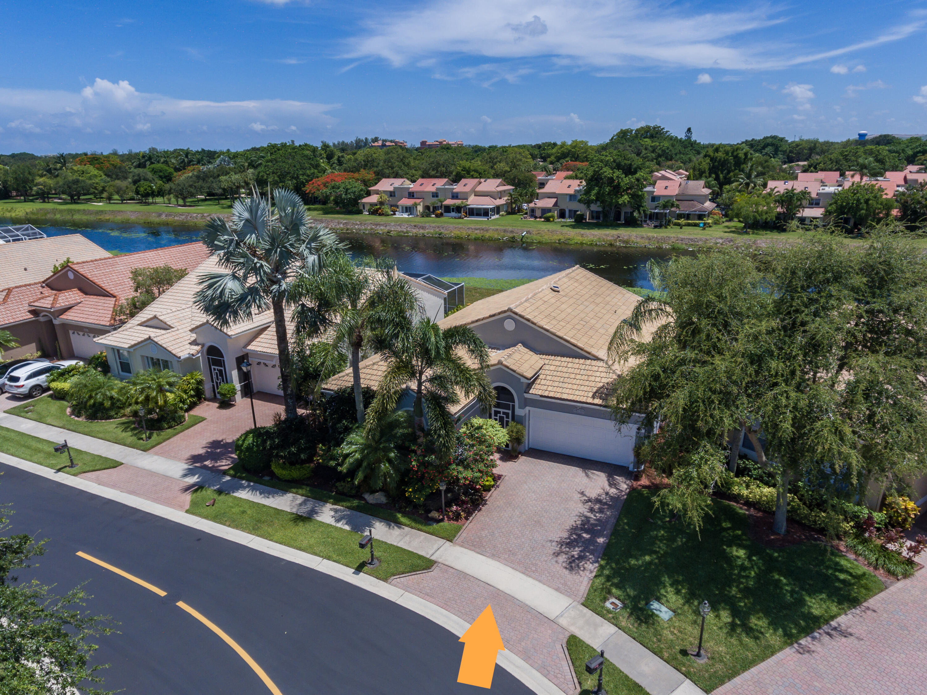 23402 Torre Circle Boca Raton, FL 33433 - Photo 38 of 44 an aerial view of a house with a lake view
