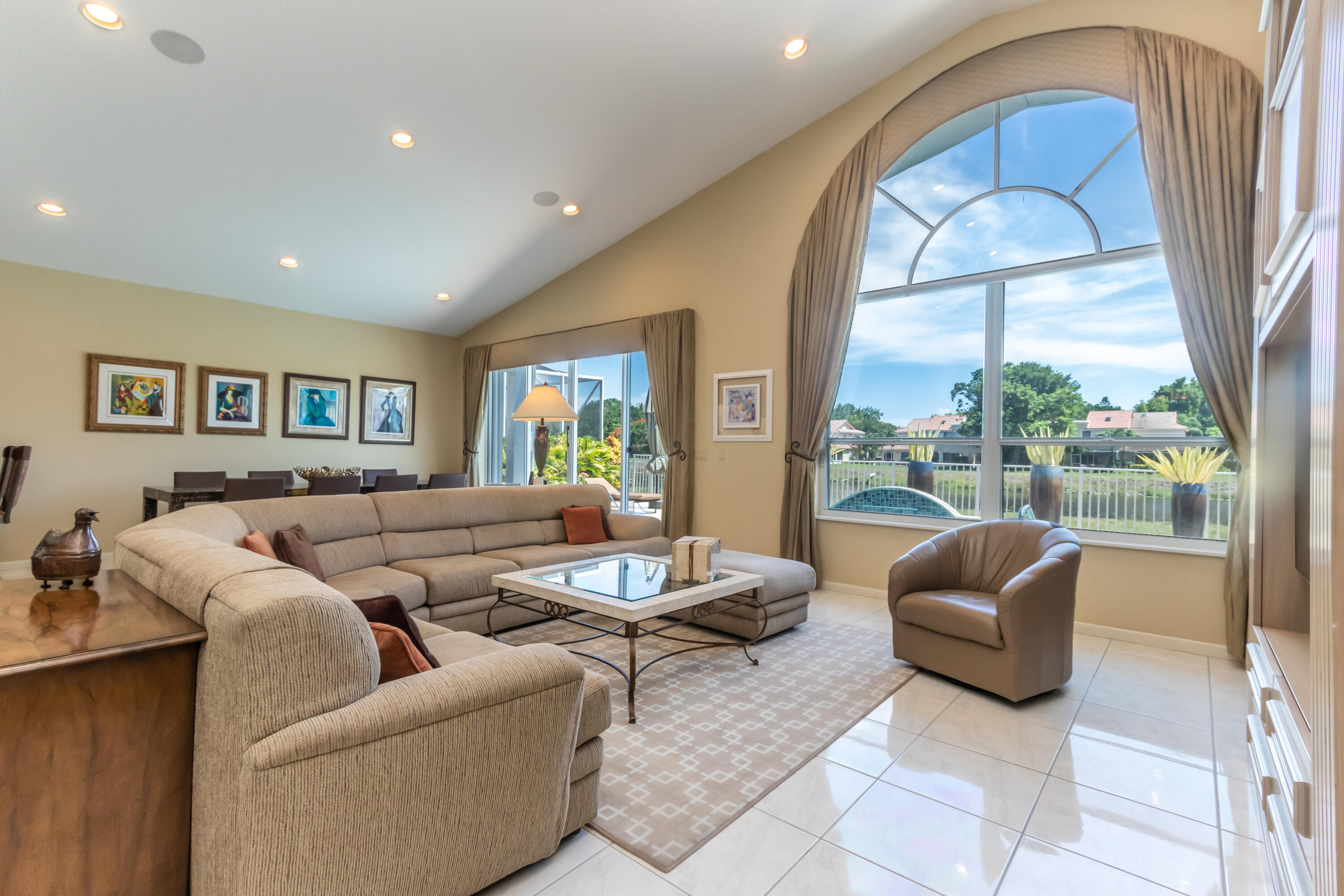 23402 Torre Circle Boca Raton, FL 33433 - Photo 7 of 44 a living room with furniture and a large window