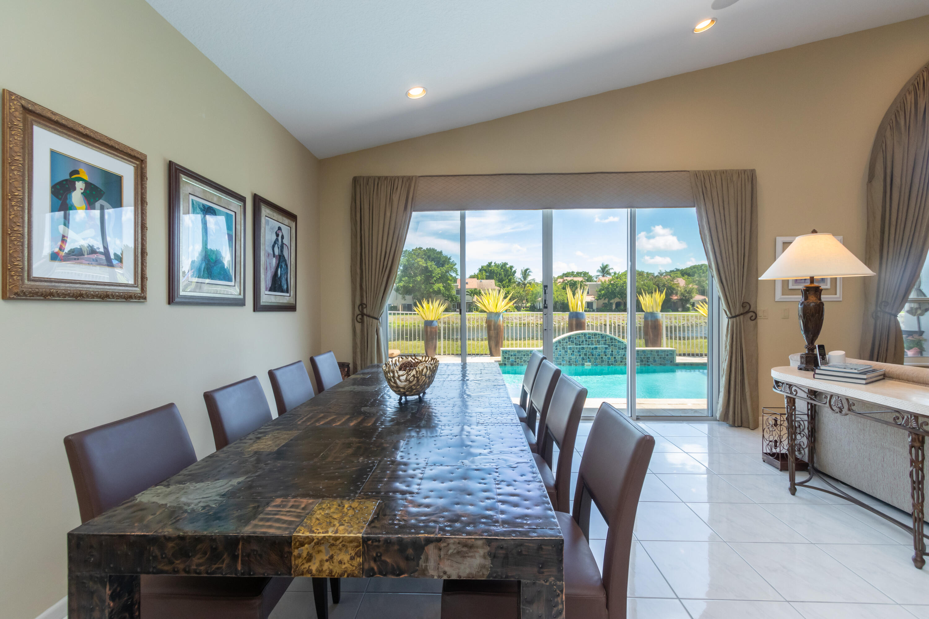 23402 Torre Circle Boca Raton, FL 33433 - Photo 8 of 44 a view of a dining room with furniture window and outside view