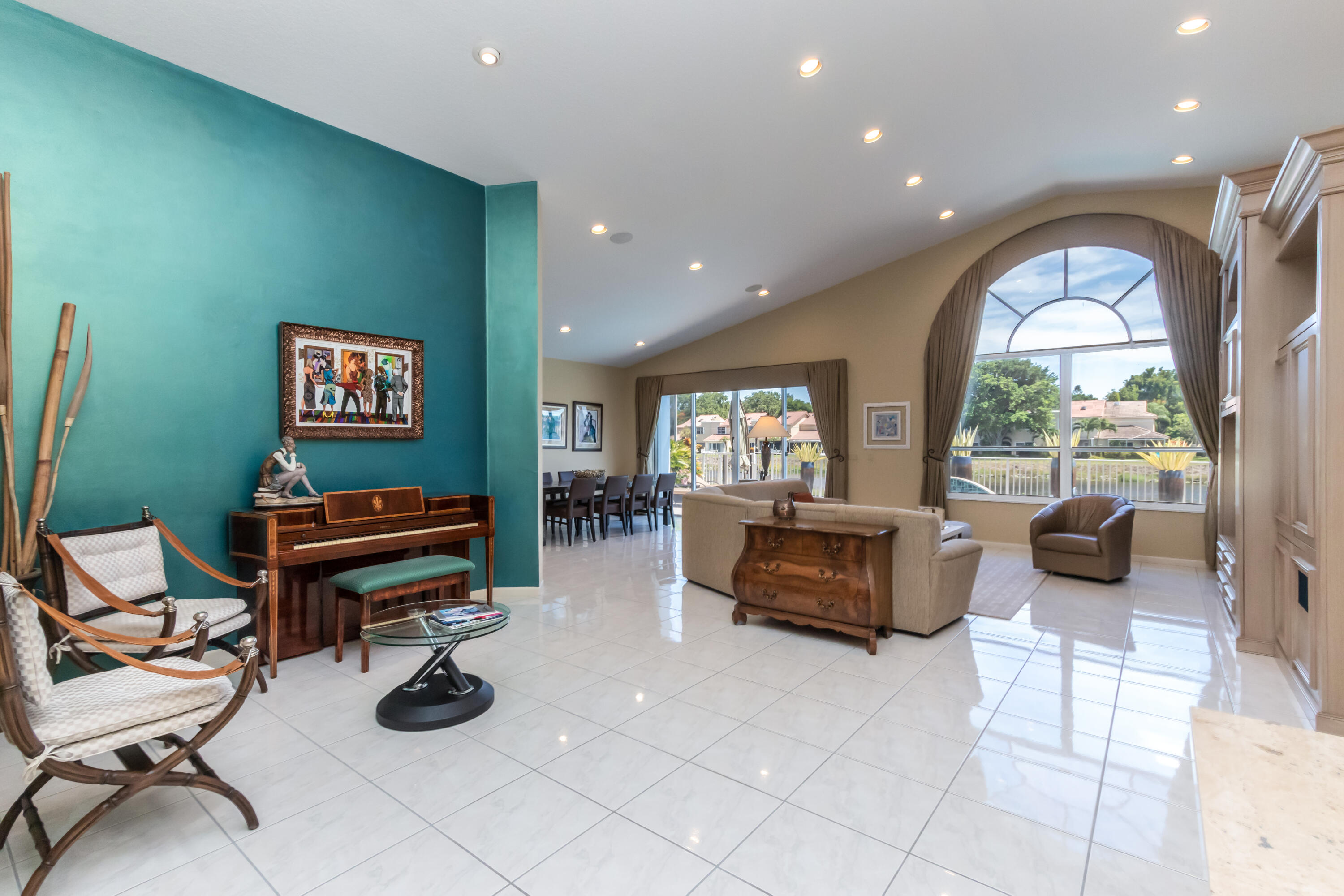23402 Torre Circle Boca Raton, FL 33433 - Photo 9 of 44 a living room with furniture and a large window