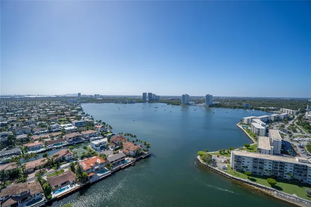 a view of a lake with a car parked