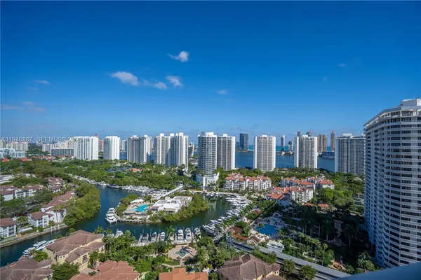 a view of a city with tall buildings